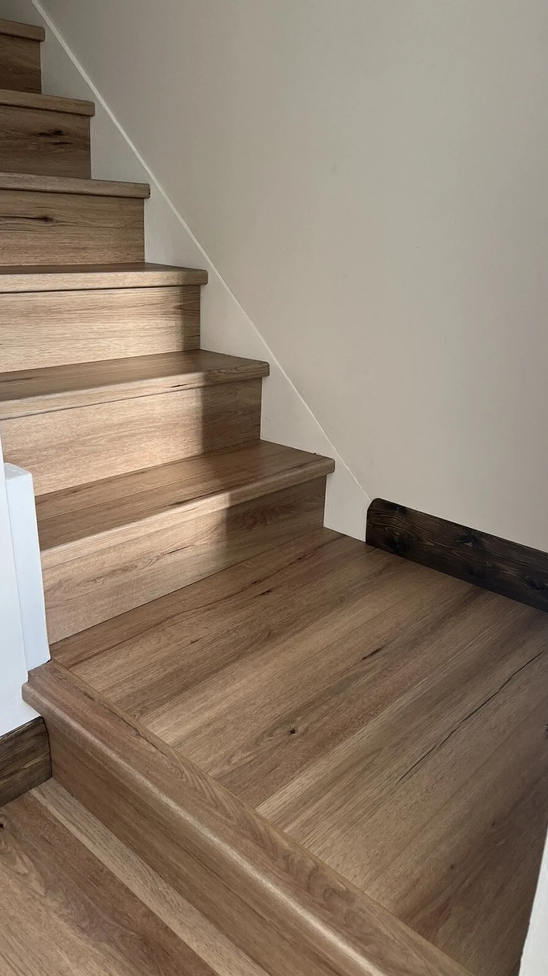 Wood staircase renovation finished design